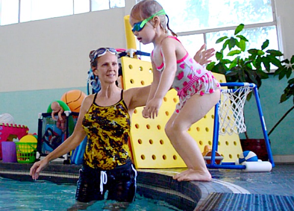 Teach your child how to jump into a pool safely.
